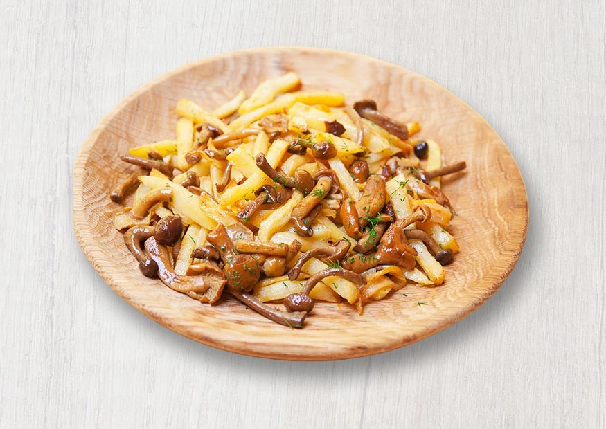 Fried potatoes with honey mushrooms