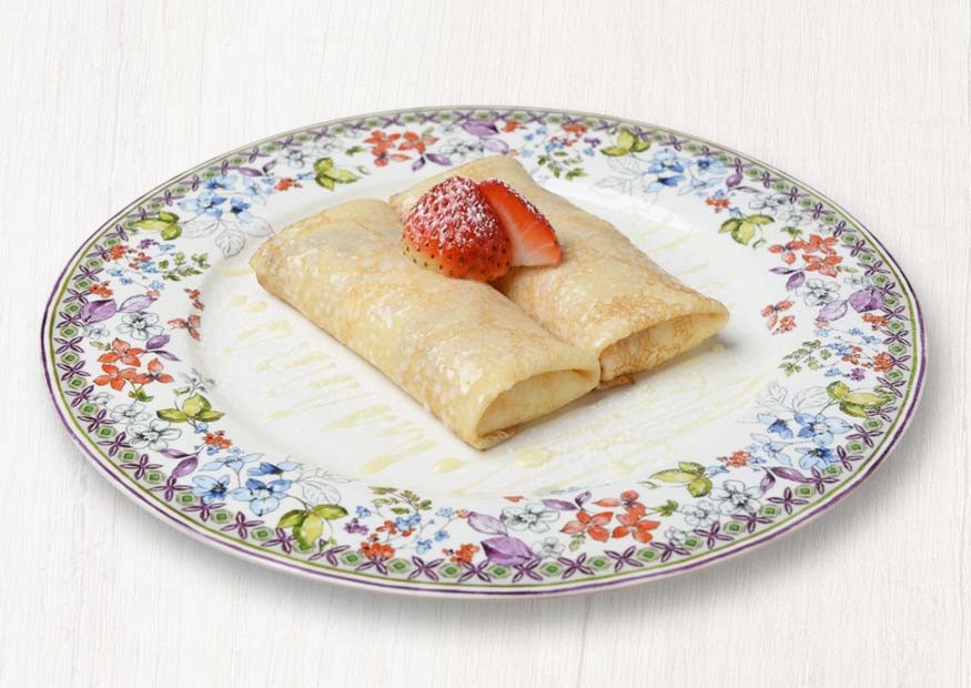 Homemade pancakes with cottage cheese and vanilla sauce