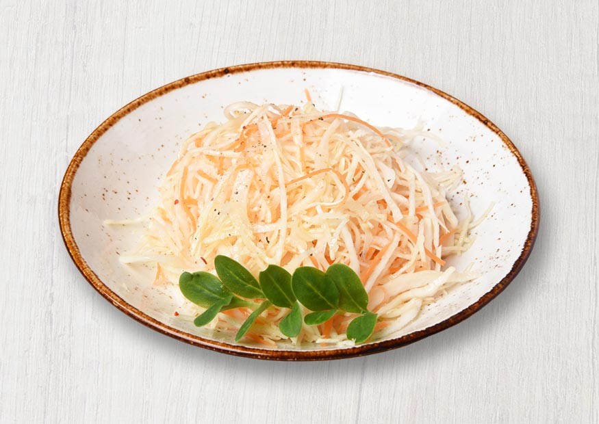 Fresh cabbage salad with carrot and fragrant oil